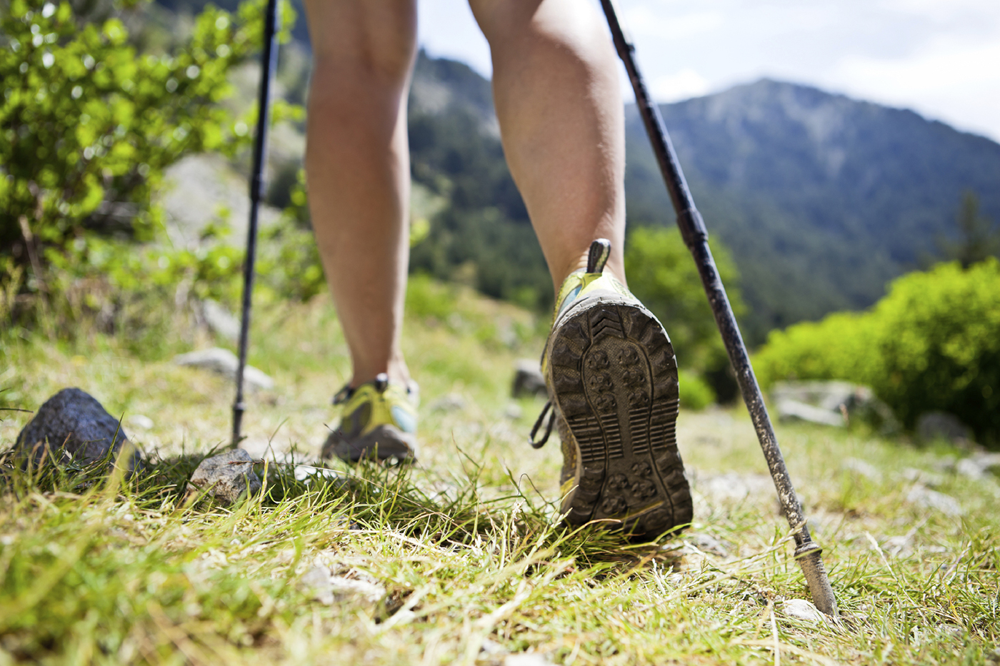 Nordic walking legs in mountains