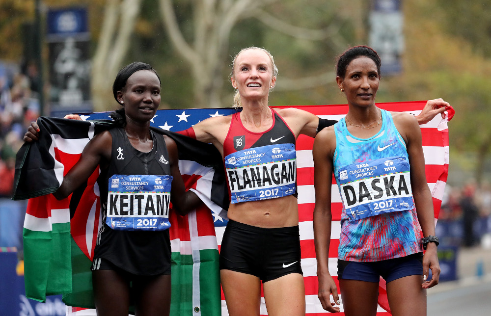 crosses the finish line during the TCS New York City Marathon in Central Park on November 5, 2017 in New York City.