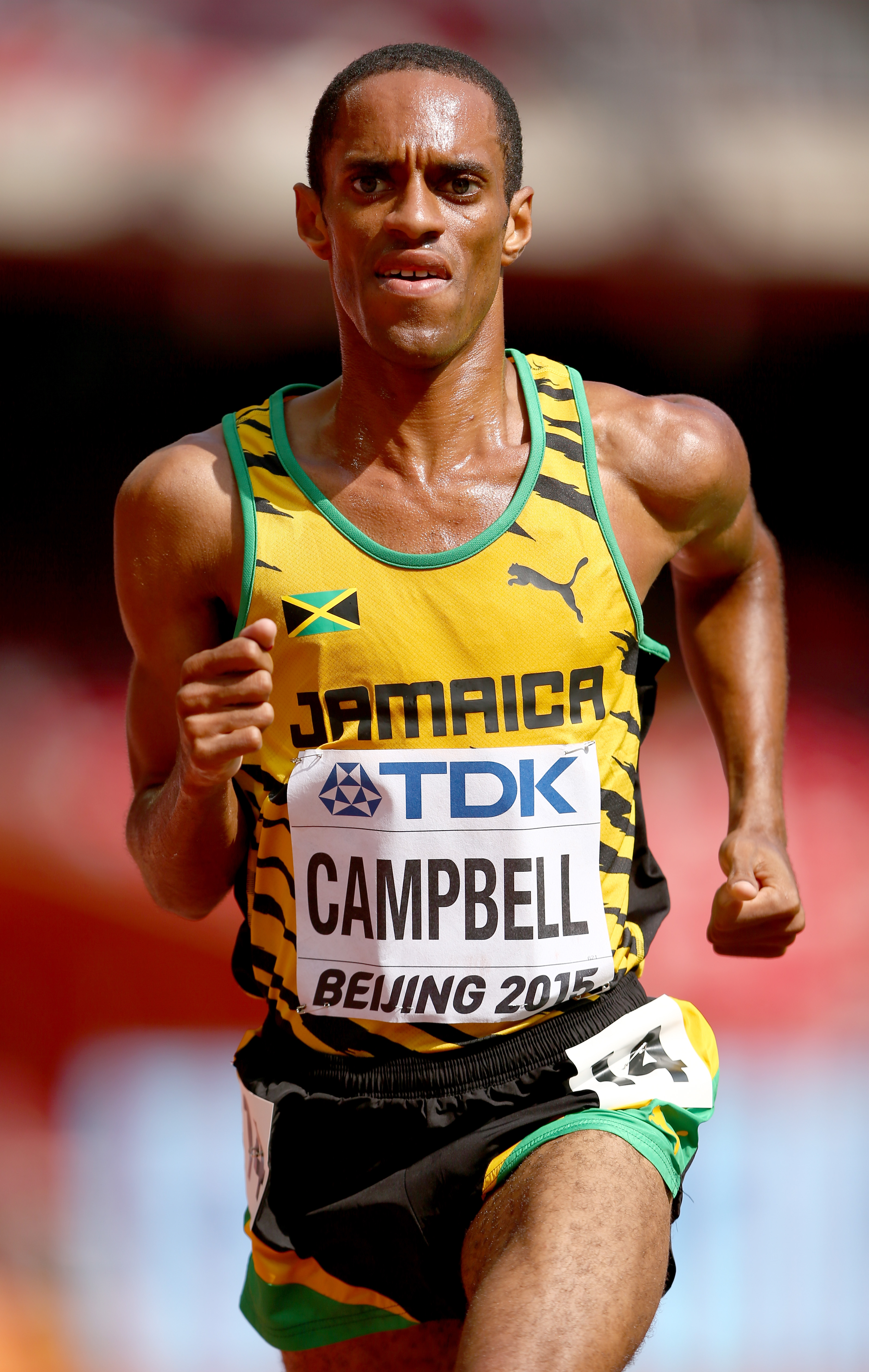 BEIJING, CHINA - AUGUST 26: Kemoy Campbell of Jamaica competes in the Men's 5000 metres heats during day five of the 15th IAAF World Athletics Championships Beijing 2015 at Beijing National Stadium on August 26, 2015 in Beijing, China. (Photo by Cameron Spencer/Getty Images)