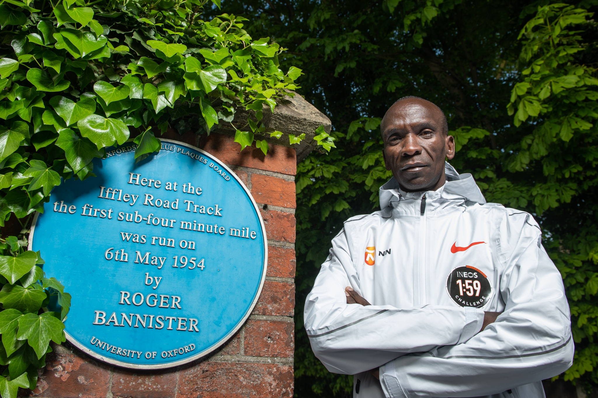 Eliud Kipchoge KEN, with the Roger Bannister blue plaque at the Iffley road running track on the 30th April 2019. Photo: Thomas Lovelock for london marathon events