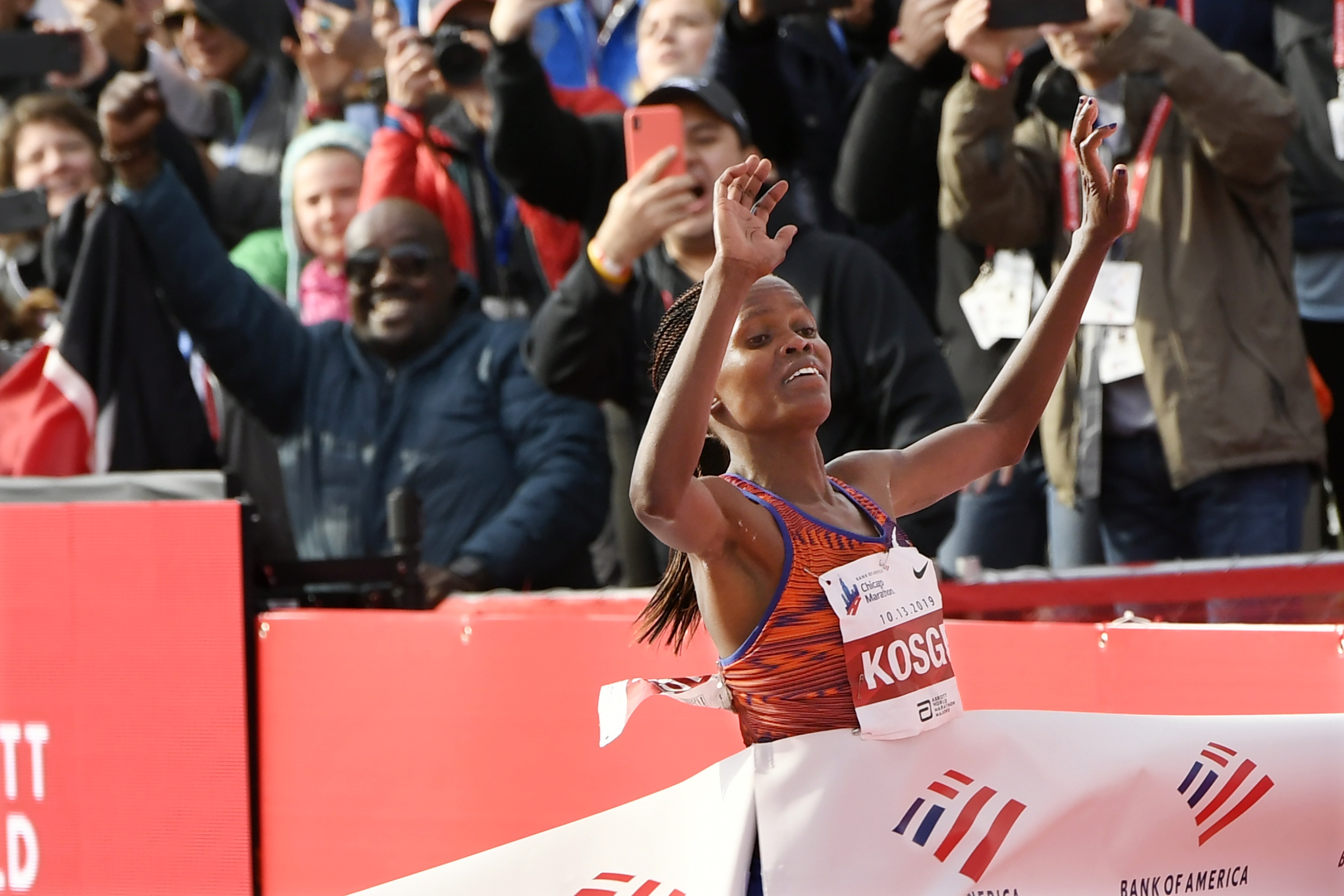 Brigid Kosgei of Kenya, wins the Women's Bank of America Chicago Marathon while setting a world record of 2:14:04 on Sunday, Oct. 13, 2019, in Chicago. (AP Photo/Paul Beaty)