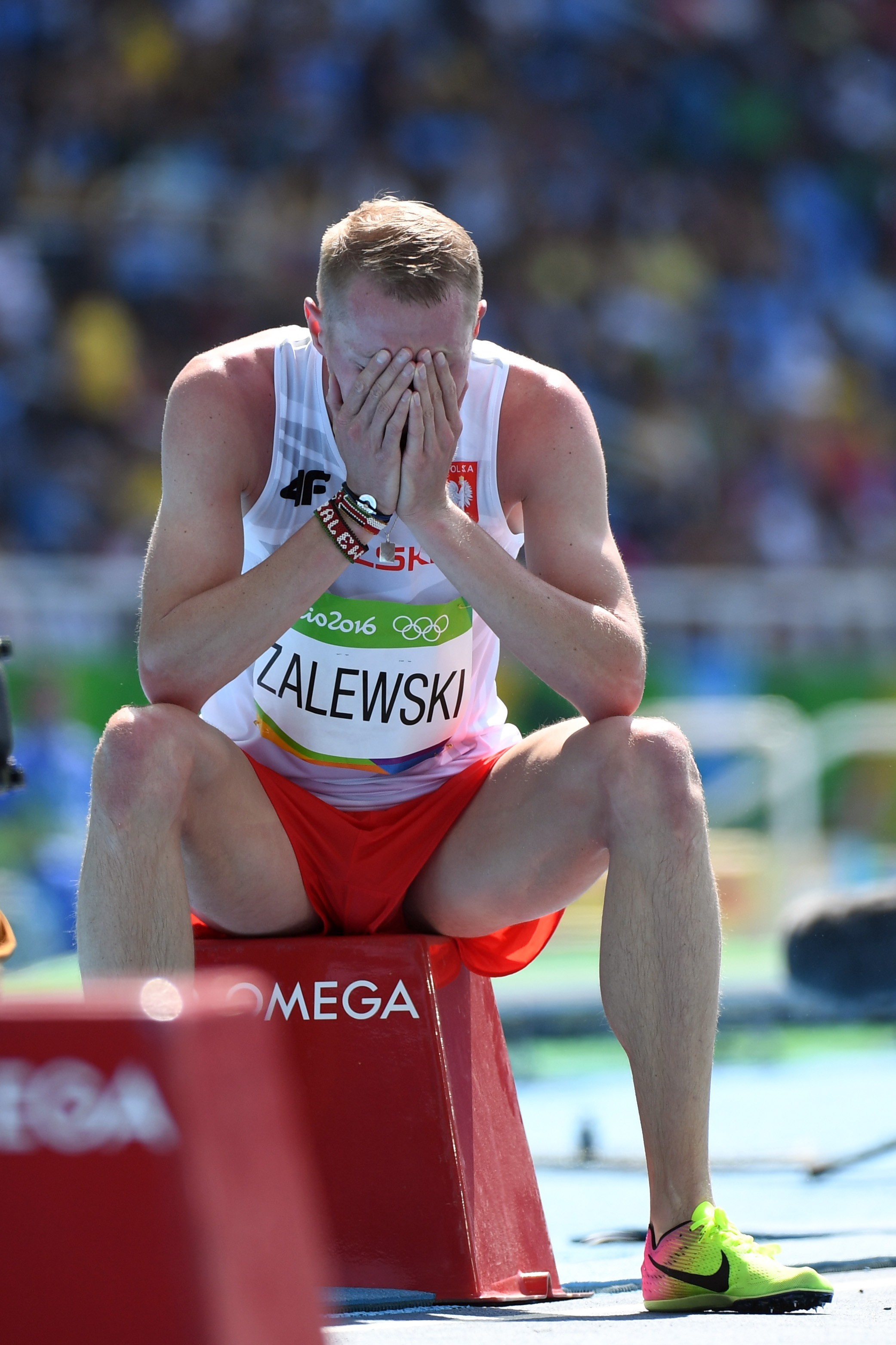 Aug 15, 2016; Rio de Janeiro, Brazil; Krystian Zalewski (POL) reacts after the men's 3000m steeplechase preliminaries in the Rio 2016 Summer Olympic Games at Estadio Olimpico Joao Havelange. Mandatory Credit: James Lang-USA TODAY Sports *** Please Use Credit from Credit Field ***