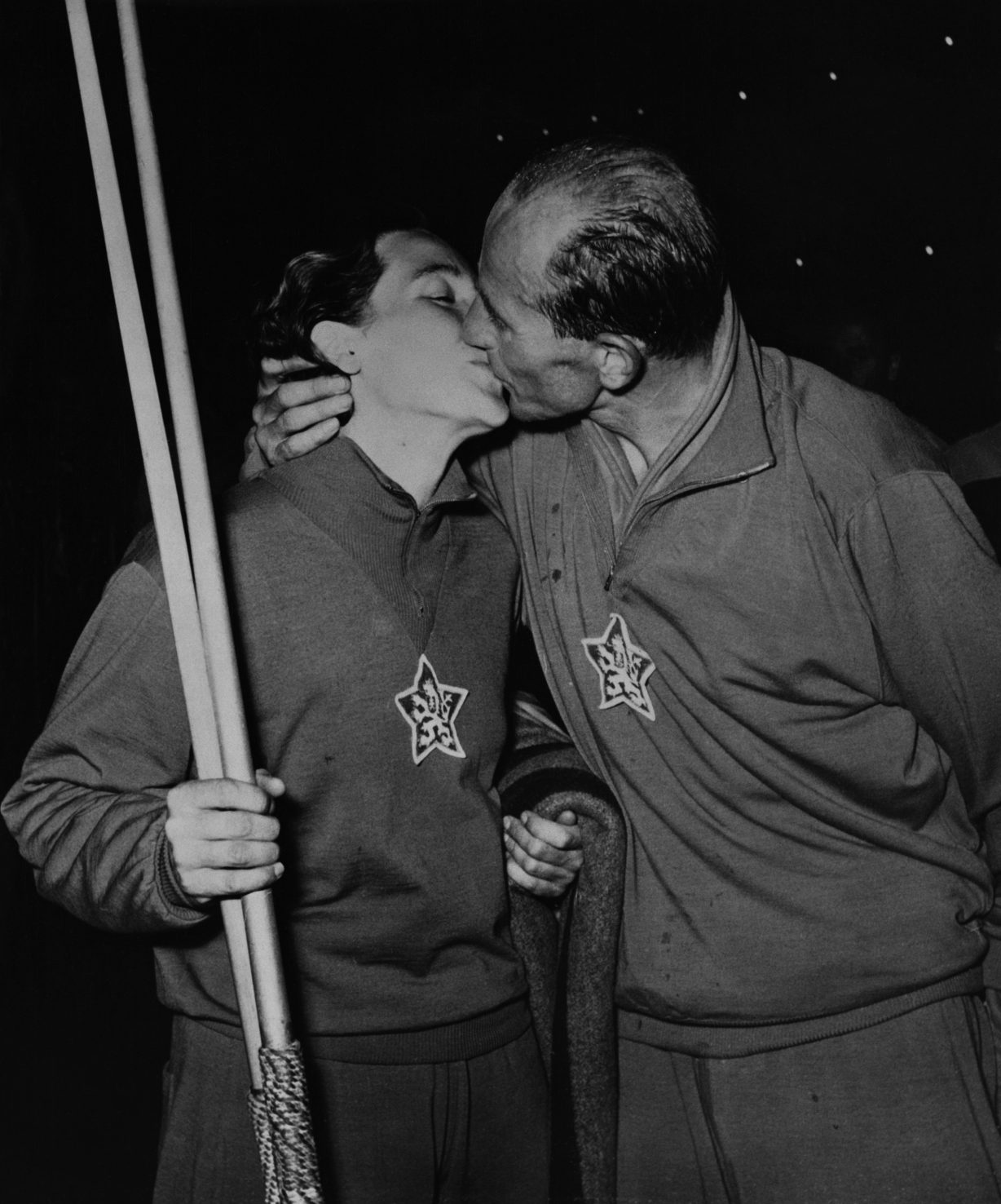 The Czechoslovakian athlete Emil Zatopek kisses his wife Dana, after they secure two gold medals in the 10,000 meters and the javelin at the European Games. Switzerland, 1954. (Photo by © Hulton-Deutsch Collection/CORBIS/Corbis via Getty Images)